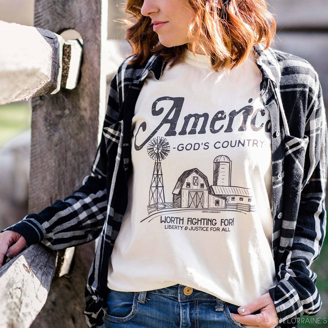 Lemon Lorraine's LLC - AMERICA GOD'S COUNTRY Graphic Tee on Comfort Colors